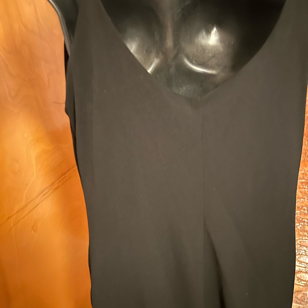 Black dress lined with black slip. 100 polyester
